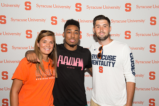 John Gillon poses with some fans