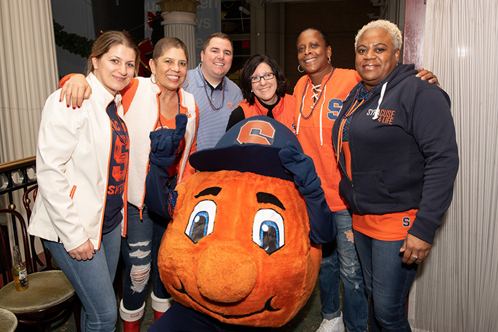Otto takes a picture with SU fans
