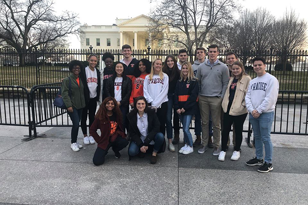 Immersion Week students take a picture outside White House.