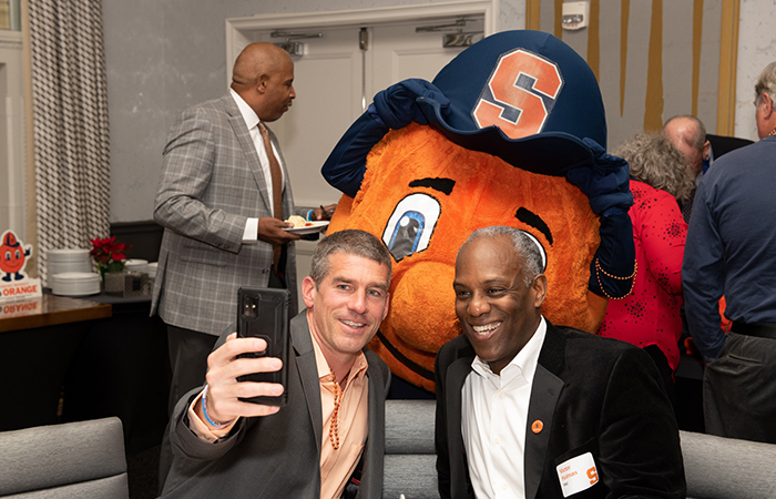 Guests take a selfie with Otto.